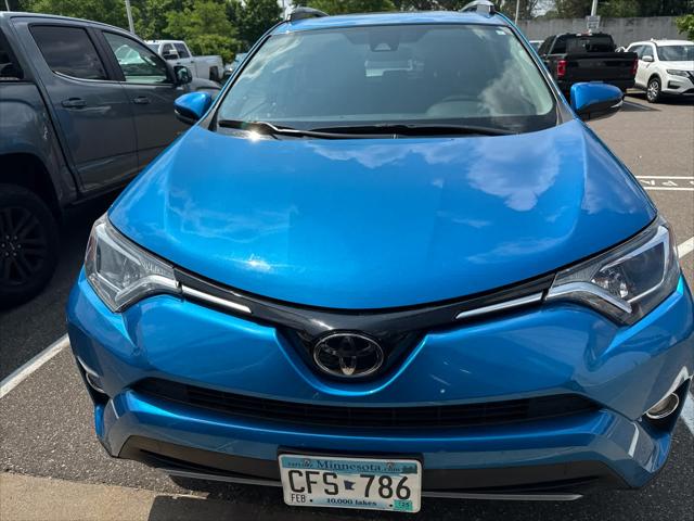 Certified 2018 Toyota RAV4 XLE with VIN 2T3RFREV9JW807595 for sale in Golden Valley, Minnesota