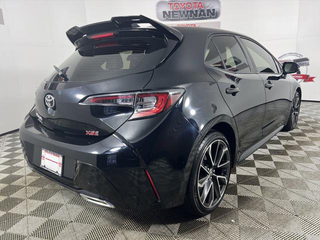 Certified 2021 Toyota Corolla Hatchback XSE with VIN JTNC4MBEXM3133916 for sale in Newnan, GA