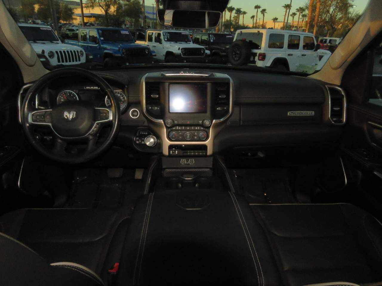 Used 2022 RAM Ram 1500 Pickup Laramie with VIN 1C6SRFJT6NN257403 for sale in Henderson, NV